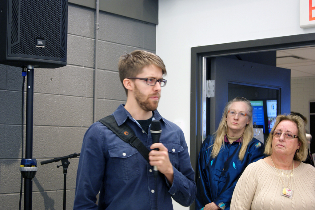Artist Nathan Johns at the Quiet Zone exhibition, World of Threads Festival 2012 opening reception.