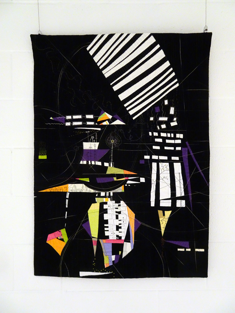 Paula Kovarik: Unglued, 2017, 40Hx29W, cotton fabrics pieced and sandwiched with cotton batting, hand stitched and machine free-motion stitching with cotton threads.