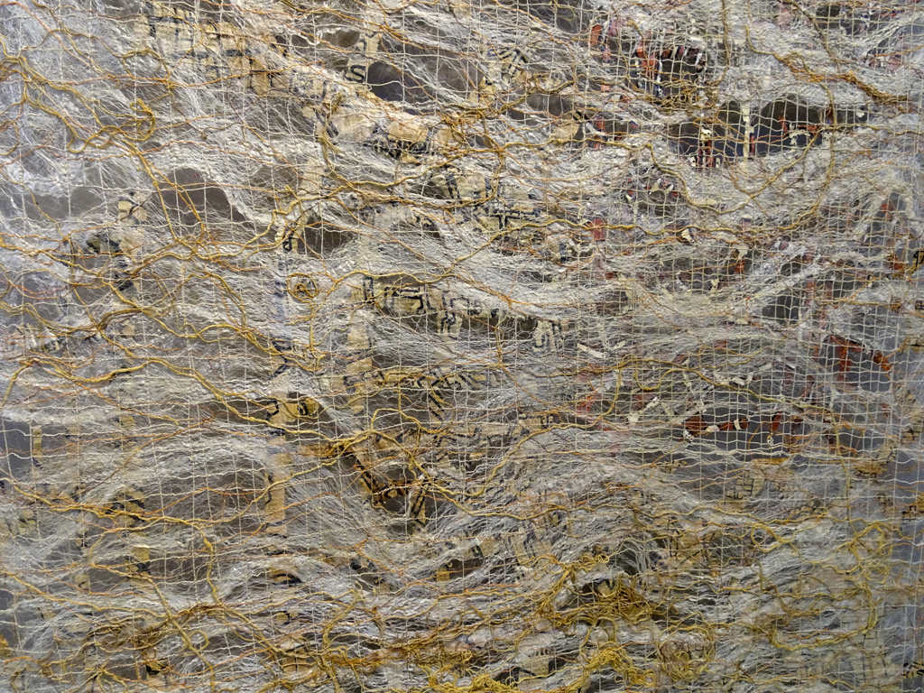 City Scape, detail, 2014, 300H x 90 W cm, silk floss, glue, Jaquard cards, newspaper, technique: glued, machine sewn.