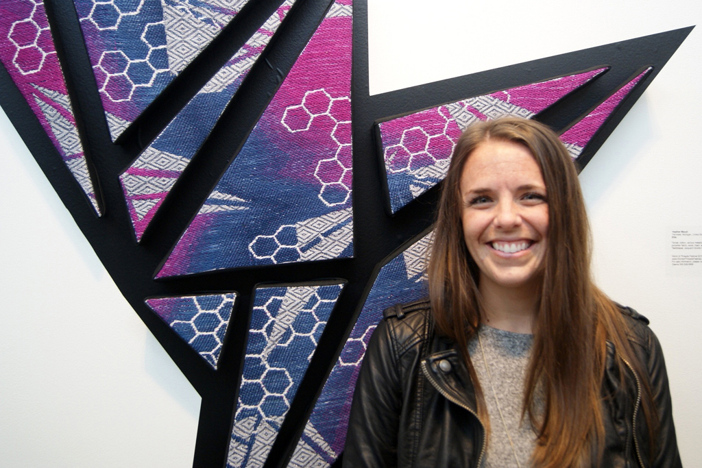 Artist: Heather Macali at the opening of the World of Threads Festival. 2016.