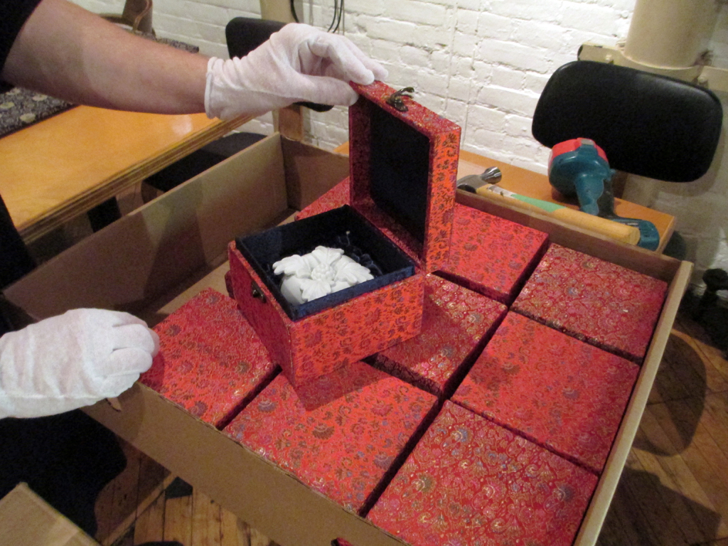 Unpacking boxes of artwork - Ling-Yueh Chuang.