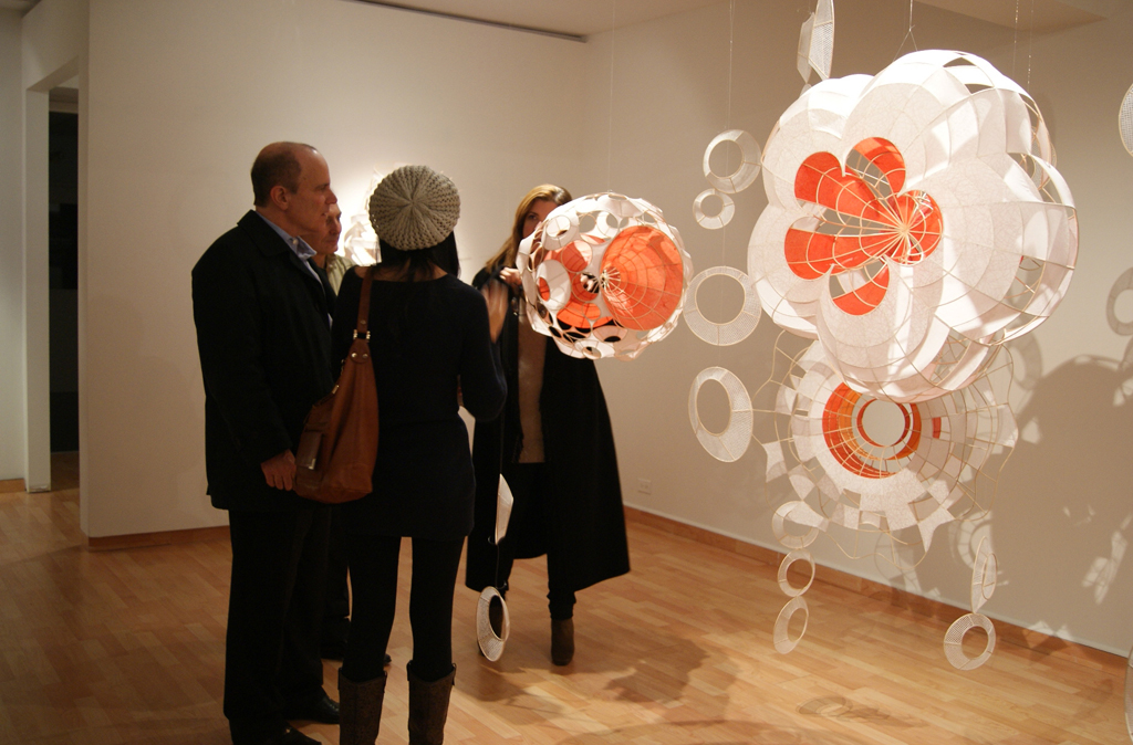 Artist: Xiaojing Yan at the opening of the Material Connections exhibition, World of Threads Festival 2012.