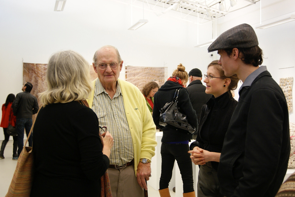 Artist Jessica Marion Barr chatting with guests at the opening reception.