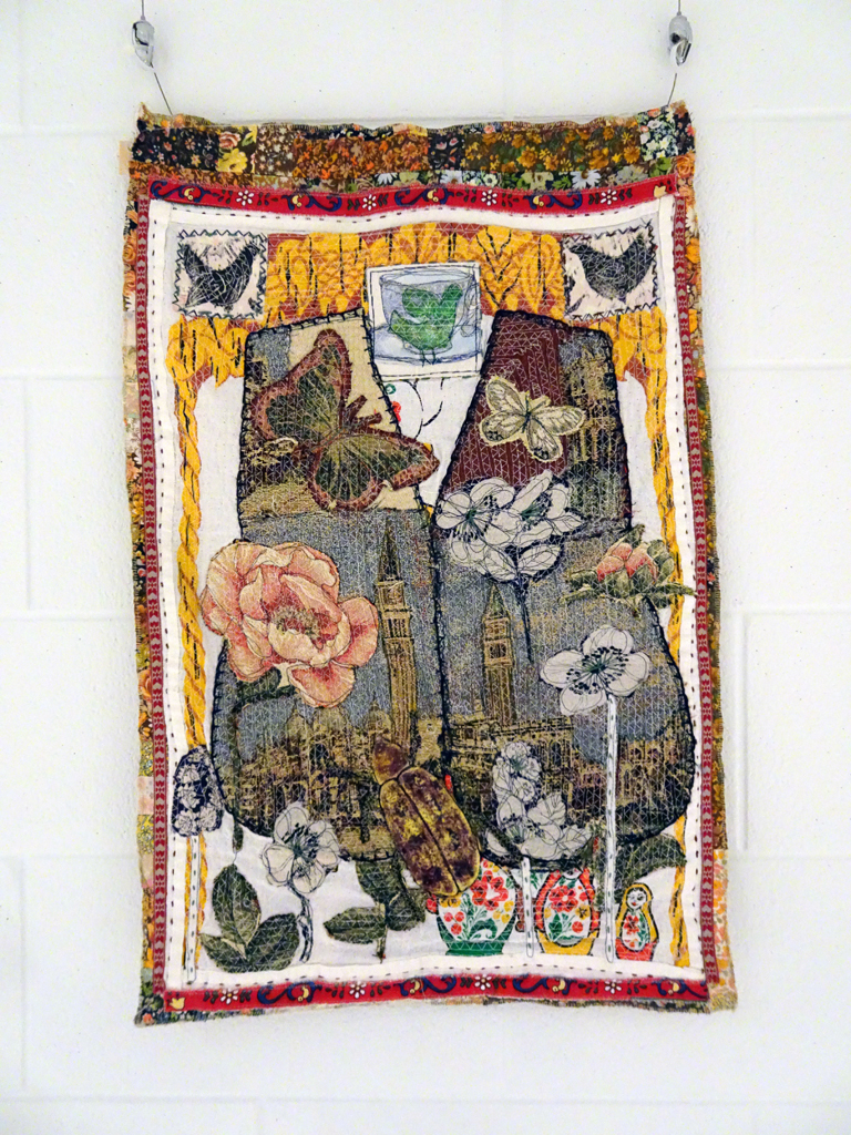 Judy Martin: Folk Waistcoat 2, 2016, 80 x 60 x .4cm,  Vintage waistcoat, tea towel, cotton, linen and coated paper elements, fabric collage inserts, Technique: textile collage using hand and machine stitching.