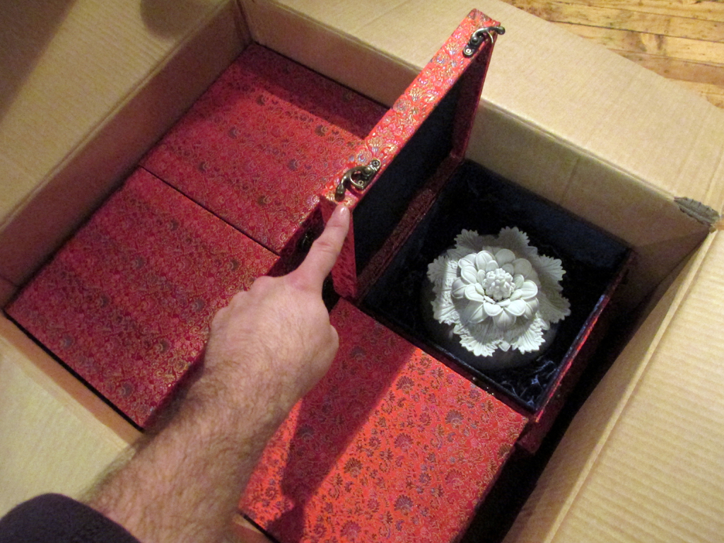 Unpacking boxes of artwork - Ling-Yueh Chuang.