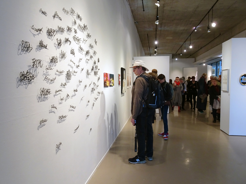 Visitors at the opening of the "me and you" exhibition, World of Threads Festival 2016.