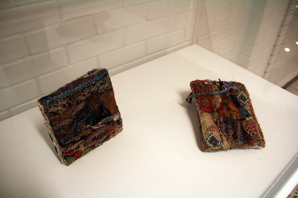 Melanie Siegel: Small Books 4 and 5. Hand stitched, felted, free motion emmbroidery, pearls, vintage fabric.