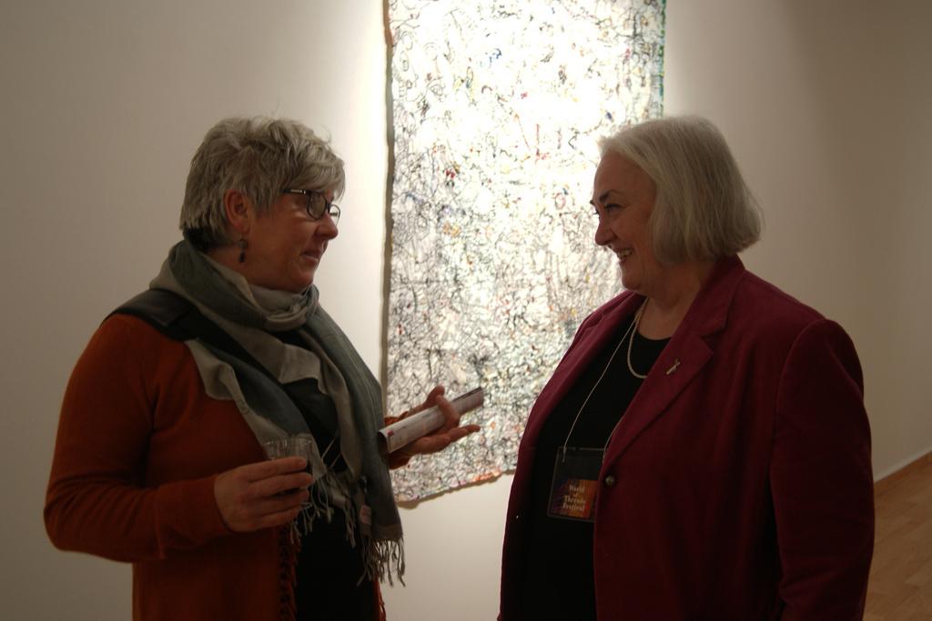 Artist, Jodi Colella and Festival Chair, Dawne Rudman at the opening of the Material 