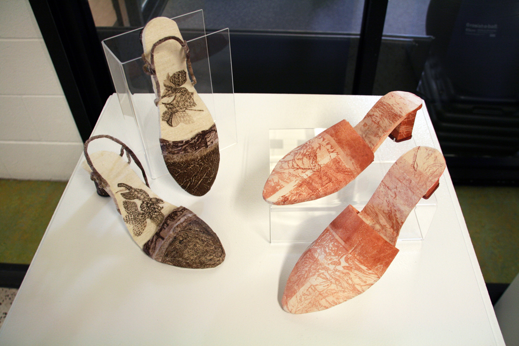 Entente, 2014 137cmH X 48cmL X 28cmW. The colouring and offset patterning is from the collagraph printmaking technique. Collected textural media (ie feathers, dried leaves etc are glued onto mat board which when sealed can be inked and the image printed on paper and material .
EXPERIENCE, 5 metres of mulberry paper was printed on by rolling ink and offsetting images from a collagraph plate. 