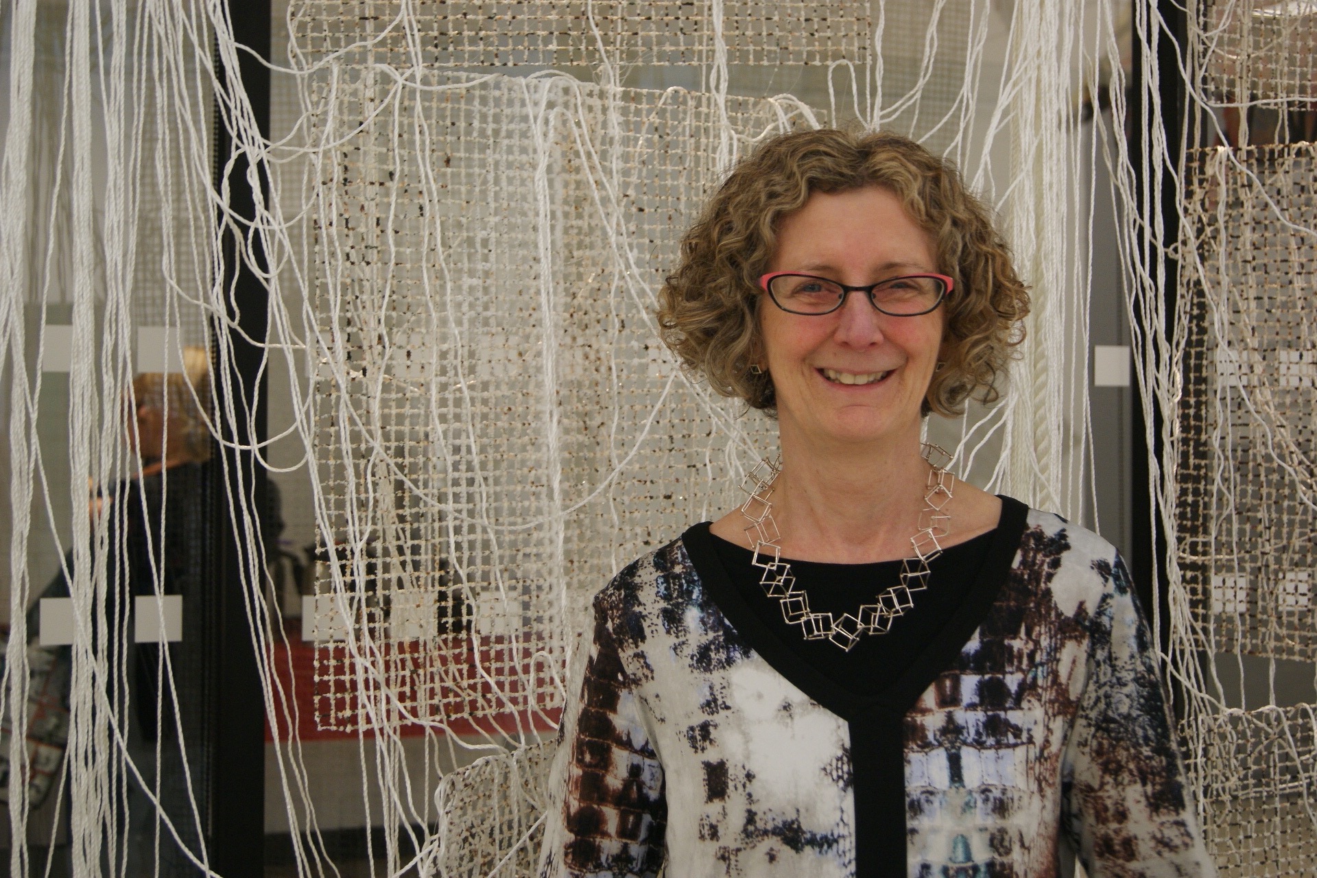 Artist: Elaine Whittaker at the opening of the World of Threads Festival. 2016.