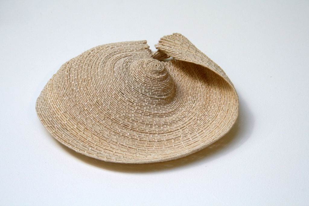 Return Line, 2014, 13 H x 17 W x 16D cm, Medium: sisal, paper, rattan, Technique: Coiling. 