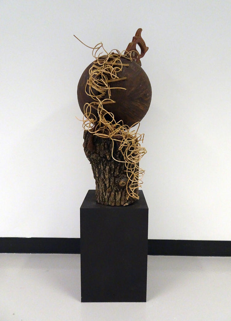 Melanie Chikofsky: Against The Grain, 2016, 127H x 46.64W x 40.64D, Wood, Found Object, Reeds, Painted Plexiglass base.