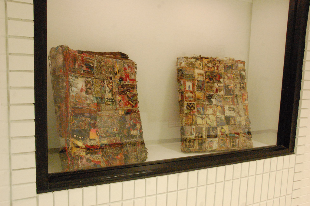 Melanie Siegel: Large Books 1, and 2, vintage fabric, trim, free-motion embroidery.