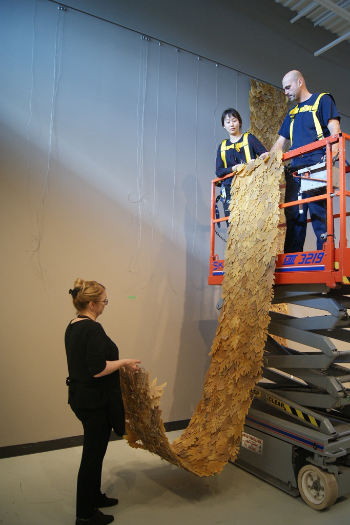 Step 3: Sections are hoisted into place.