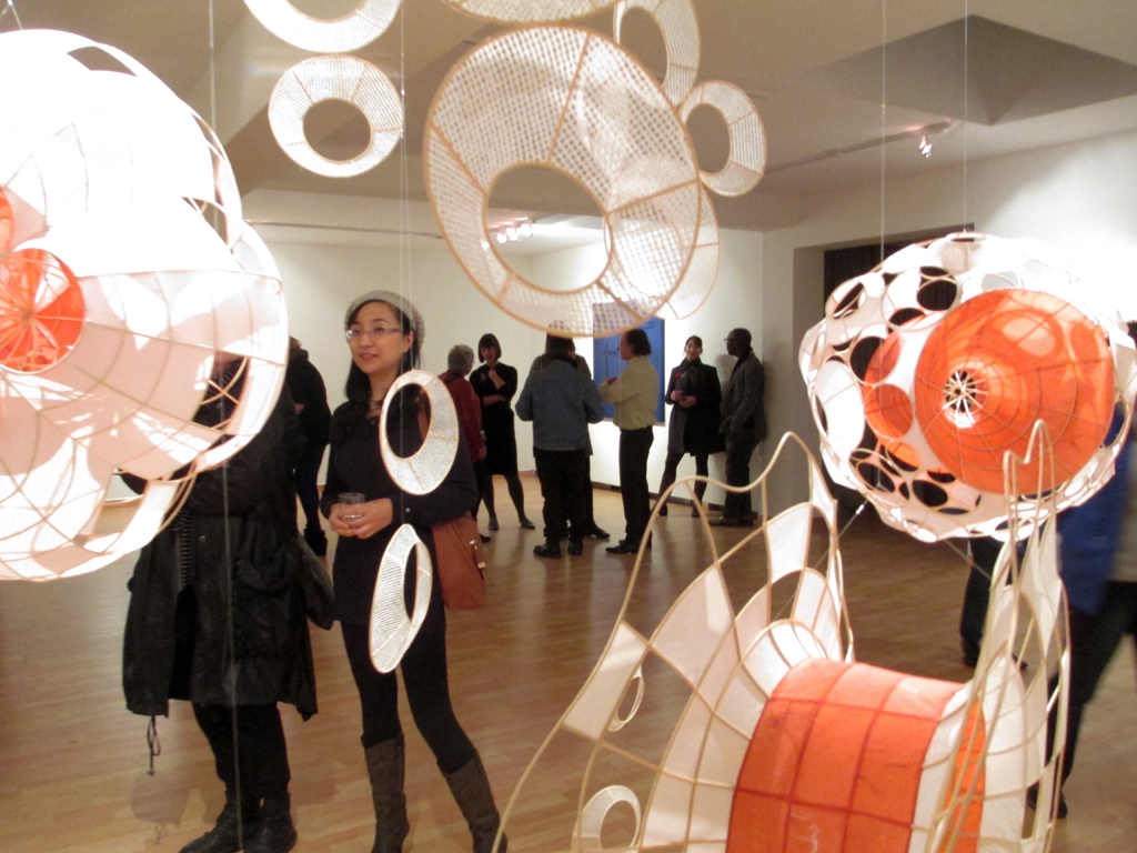 Artist: Xiaojing Yan at the opening of the Material Connections exhibition, World of Threads Festival 2012.