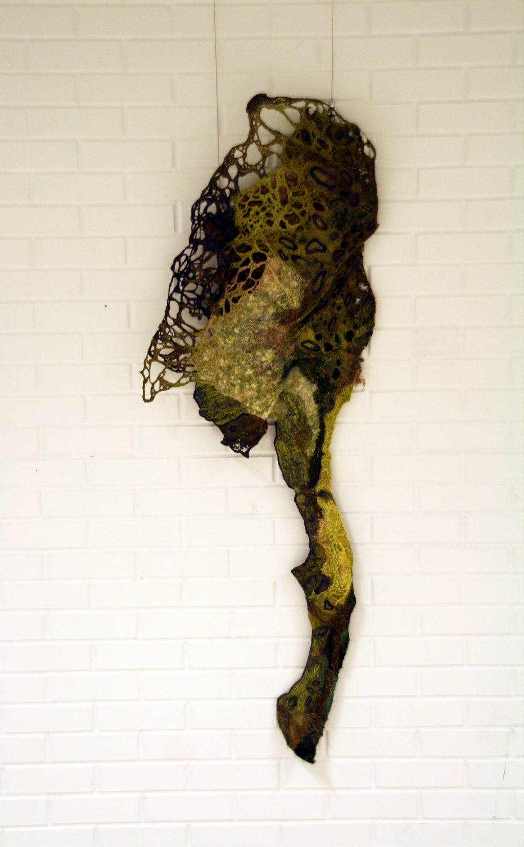 Pool, 2014, H 145cm X W 57cm X 5cm D, Screen printed silk fabric, synthetic voile, velvet, felt, scrim. Techniques used: include Screen printing, free machine embroidery, quilting, machine drawn thread work, ruching, heat distressing and appliqué.