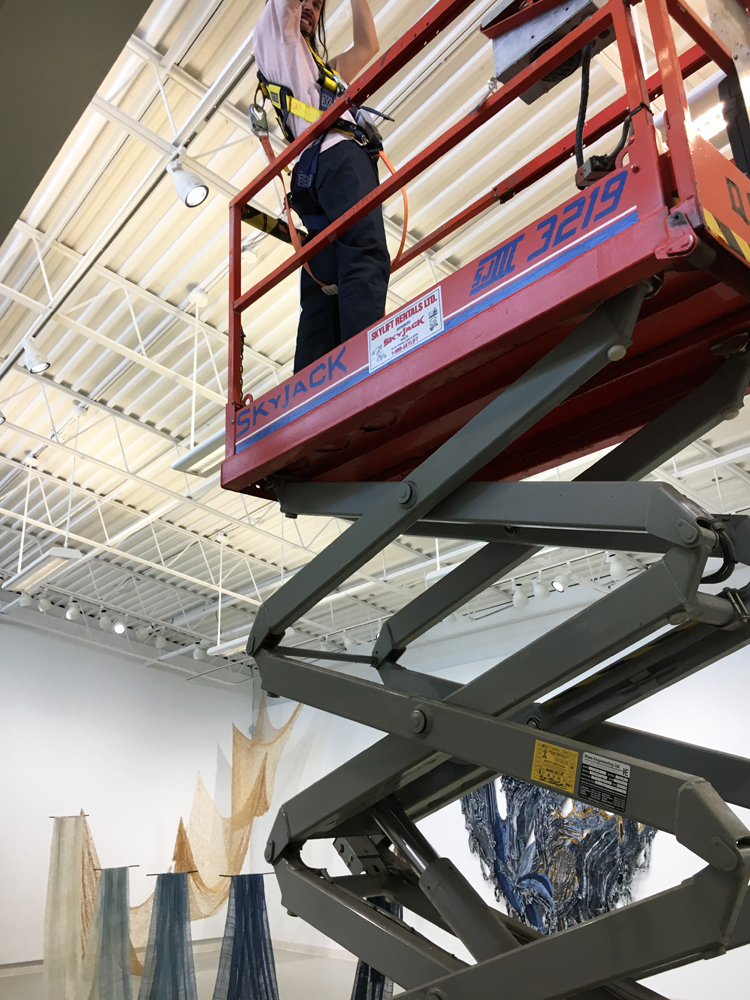 On the Skyjack, installing the Flow exhibition.