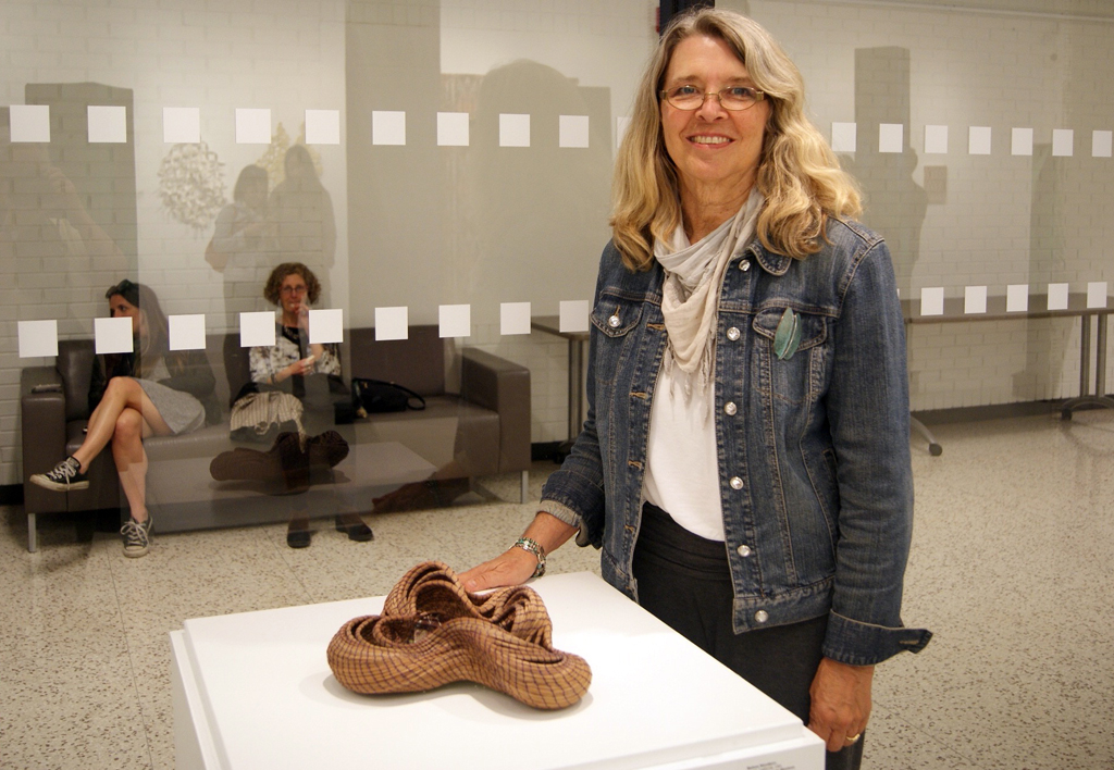 Artist: Melissa Woodburn at the opening of the World of Threads Festival. 2016.