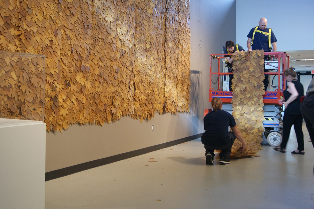 Step 3: More and more sections are hoisted into place.