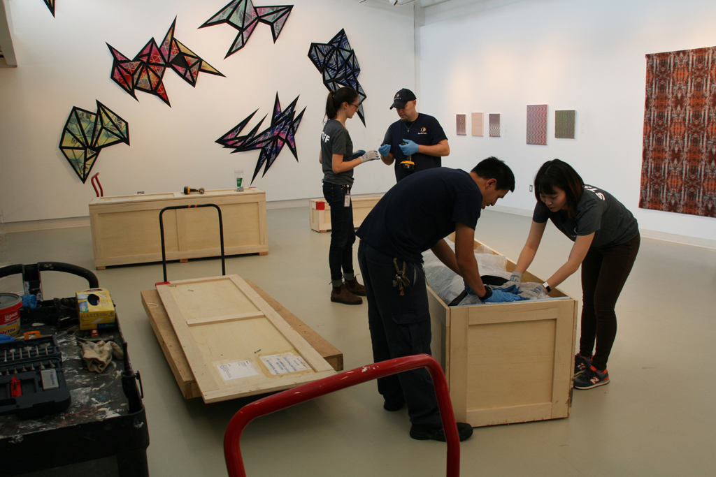 A shipment of massive crates arrives from Shaw Island, Washington, USA, World of Threads Festival 2016.