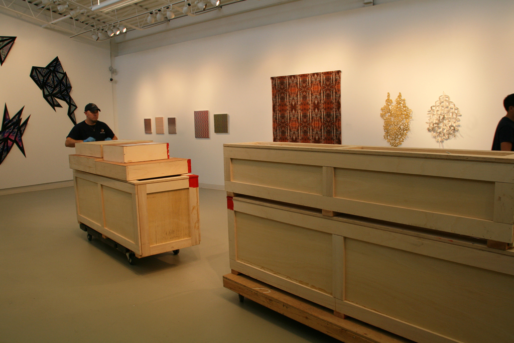 A shipment of massive crates arrives from Shaw Island, Washington, USA, World of Threads Festival 2016.