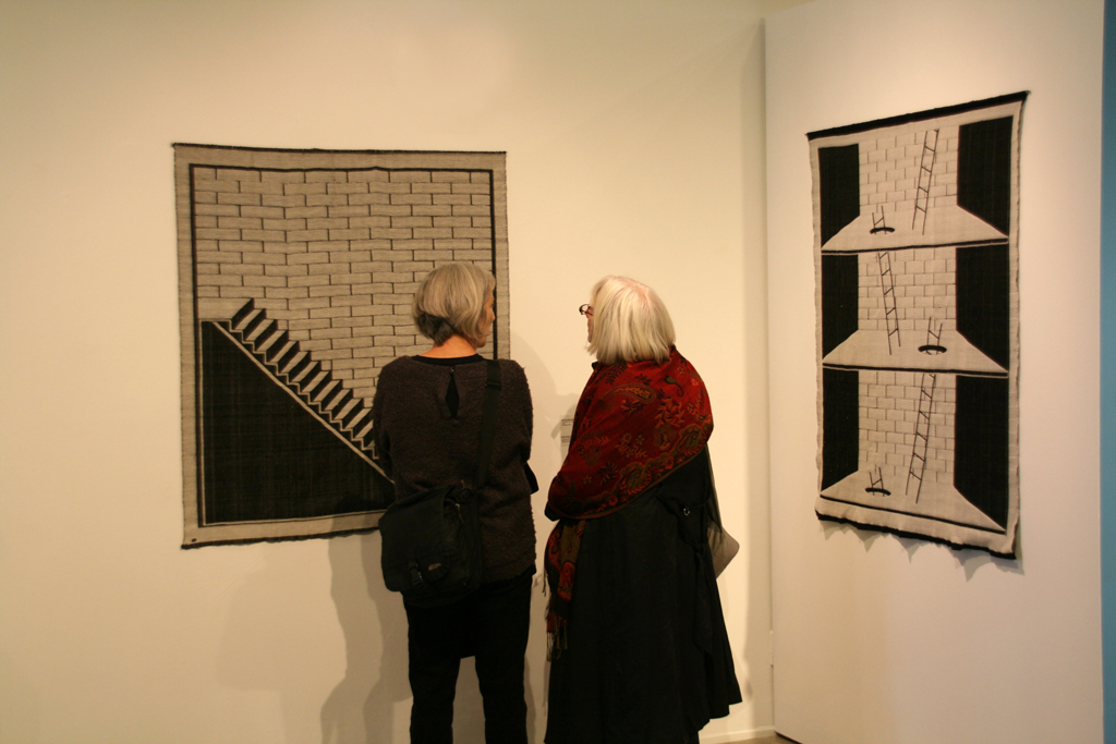 Visitors at the opening of Strung out and Undone exhibition, World of Threads Festival 2014.
