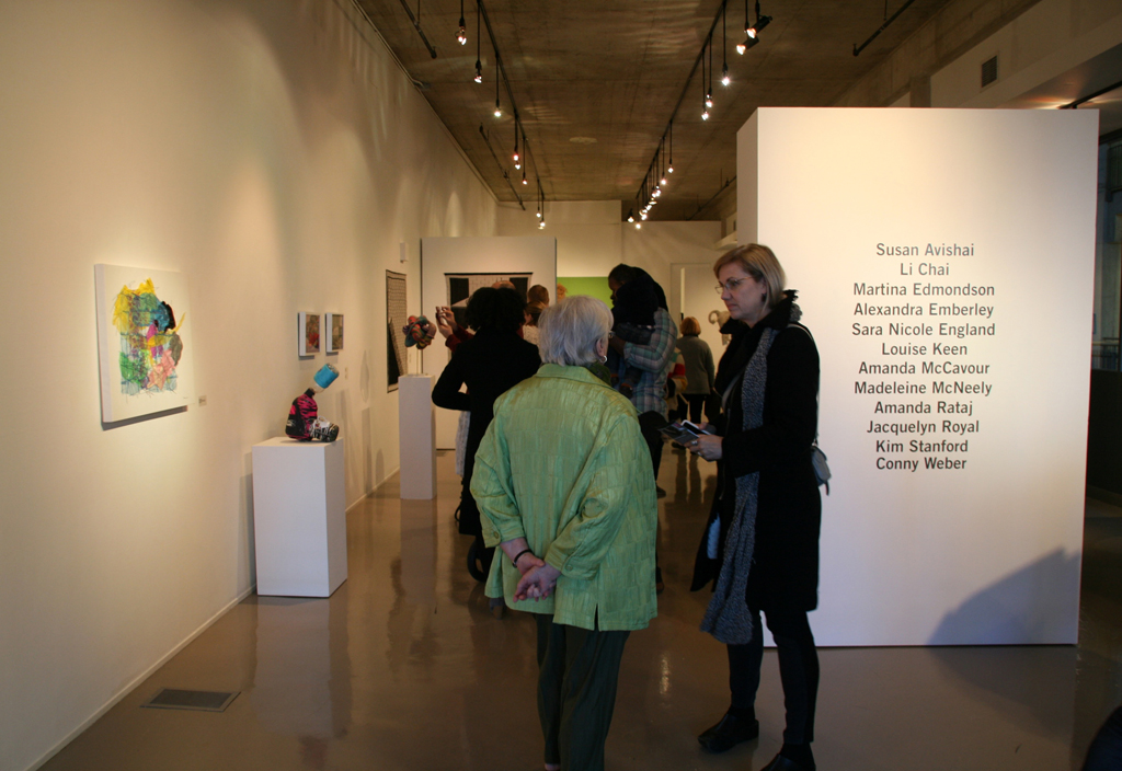 Visitors at the opening of Strung out and Undone exhibition, World of Threads Festival 2014.