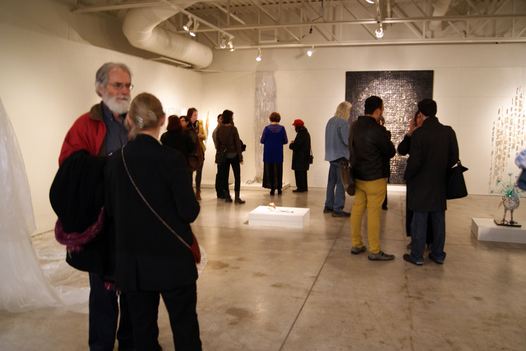 Artists and visitors at the opening of the Memento mori exhibition.