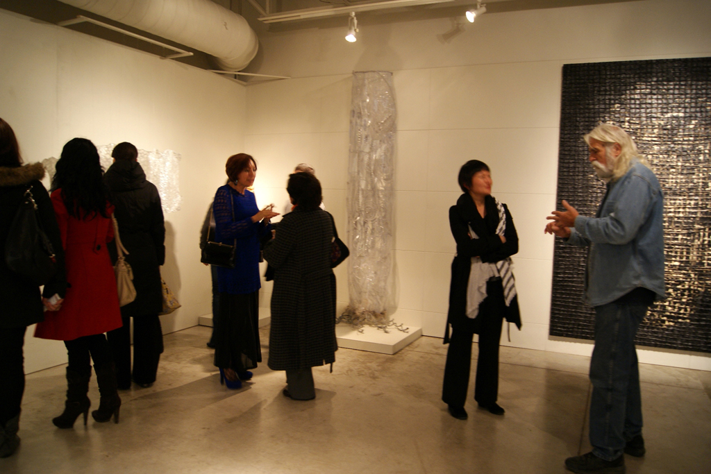 Artists and visitors at the opening of the Memento mori exhibition.