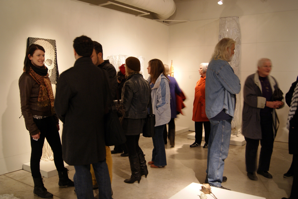 Artists and visitors at the opening of the Memento mori exhibition.