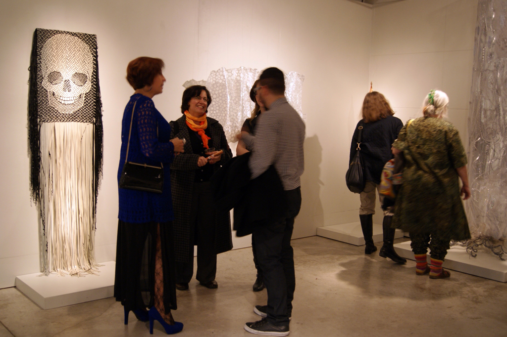 Artists and visitors at the opening of the Memento mori exhibition.