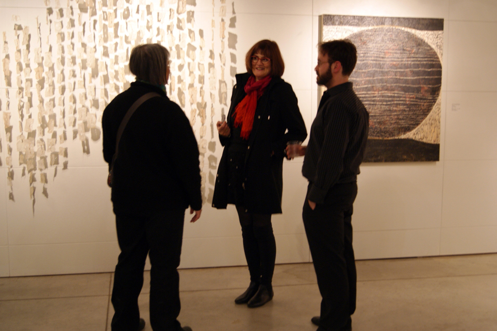 Visitors chatting to Curator Gareth Bate.