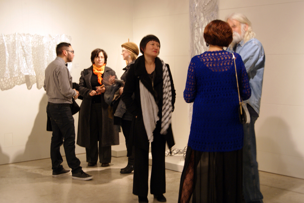 Artists Emily Yan and Ixhel Suarez chatting to Installer Jamie Owen.