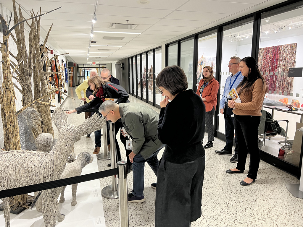 Tour by the Town of Oakville management, looking at the Cycle of Life installation World of Threads Festival 2023-24.