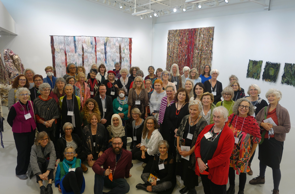 67 Artists and 2 Curators gathered at the opening of the World of Threads Festival 2023-24. Visible artworks by Deborah Kruger, Melanie Siegel and Kate Sellar.