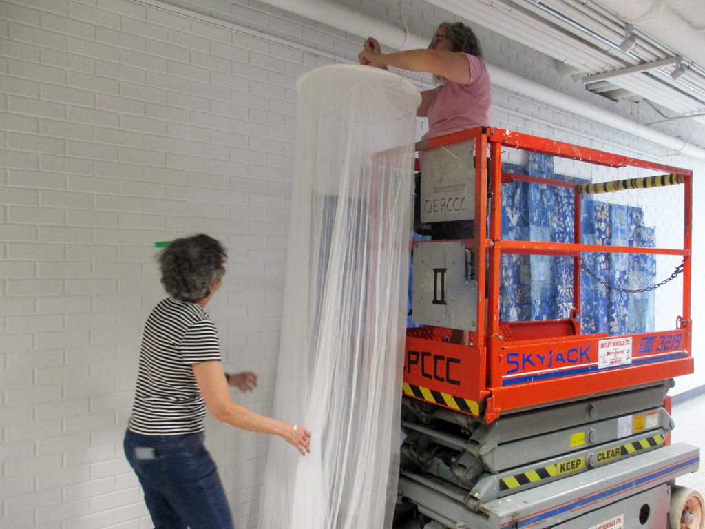 Artist: Elaine Whittaker and Festival Installer: Heidi install Filmentous installation, World of Threads Festival 2023-24.