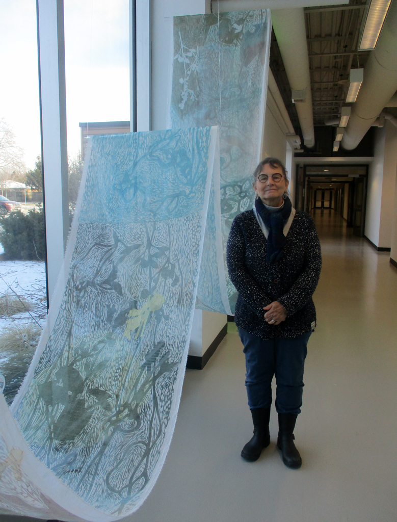 Artist: Judy Major Girardin at the opening of the World of Threads Festival 2023-24.