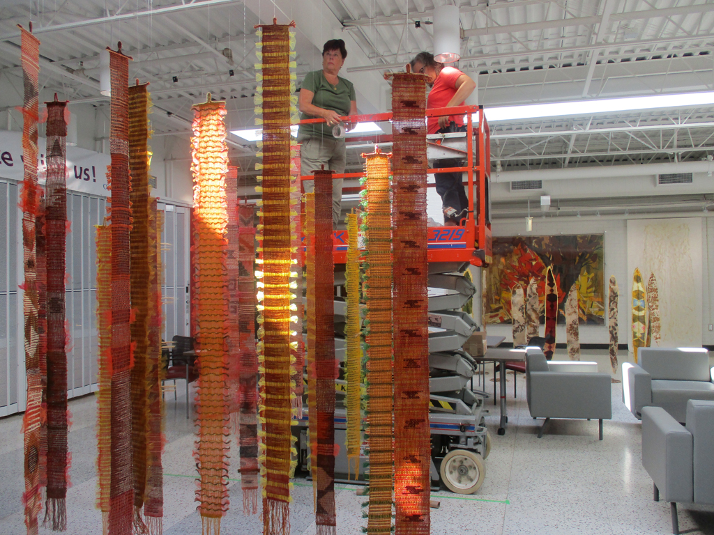 Festival installers: Heidi and Freda, working on the Diaphanous, World of Threads Festival 2023-24.