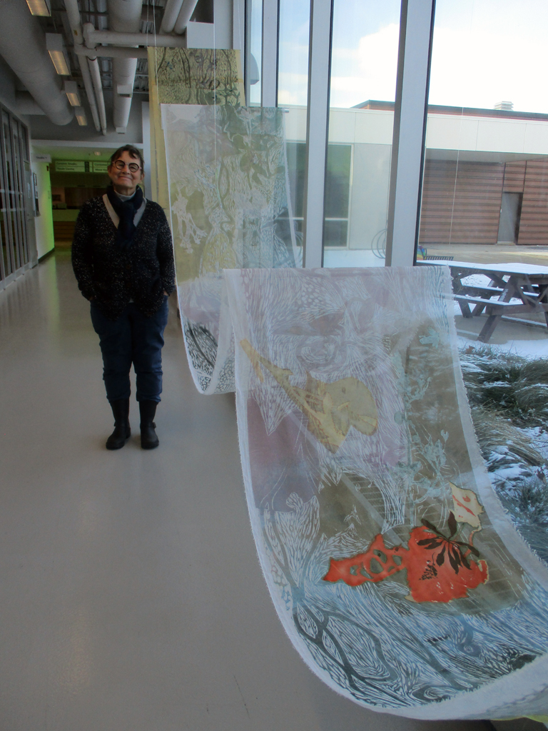 Artist: Judy Major Girardin at the opening of the World of Threads Festival 2023-24.