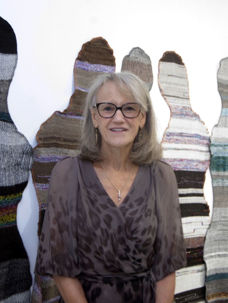 Artist: Carolyn Carson at the opening of the World of Threads Festival 2023-24.