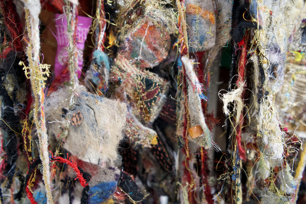 The Travelers Coat, detail, Melanie Siegel, Cat Walk III, World of Threads Festival 2023-24.