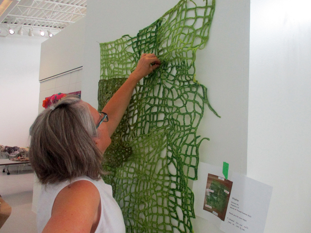 Festival installer Heidi installing.