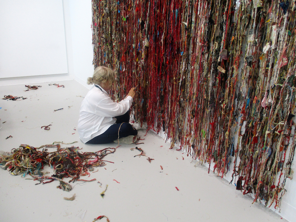 Artist Melanie putting the finishing touches to her installation art piece.