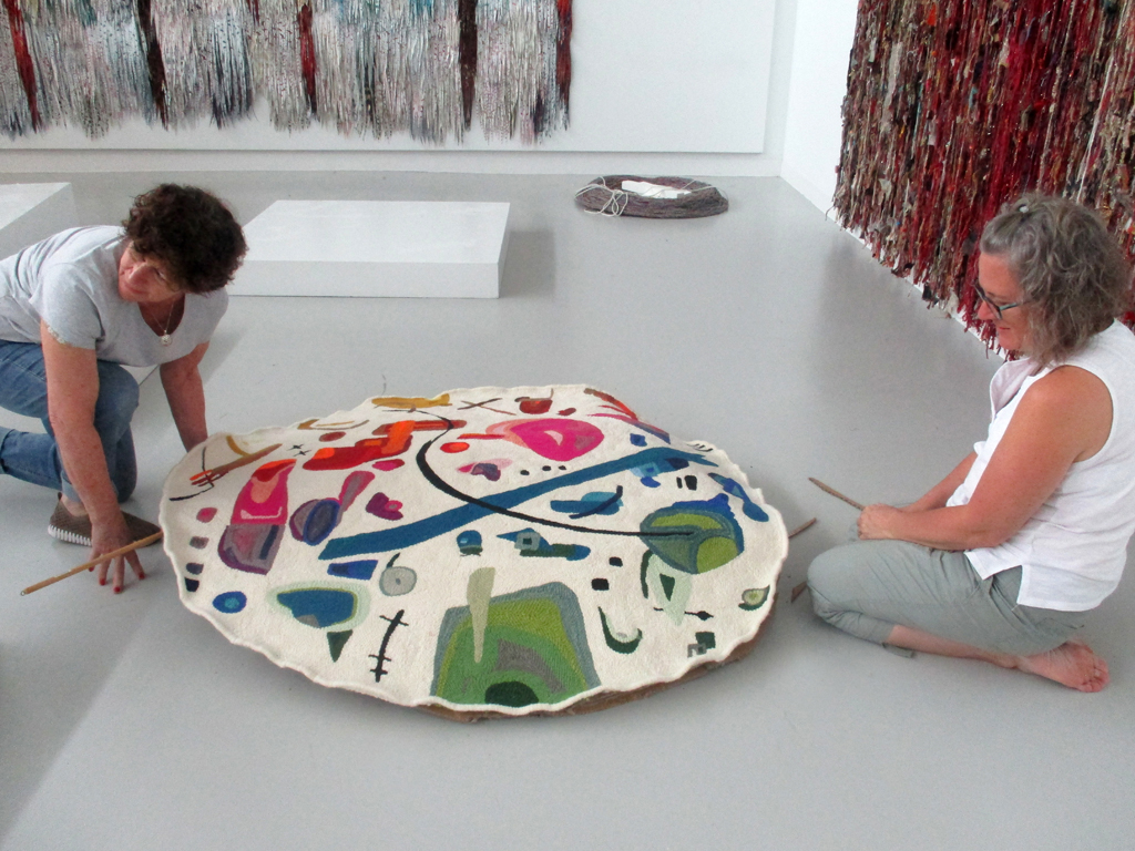 Festival installers Carol and Heidi getting down to business.