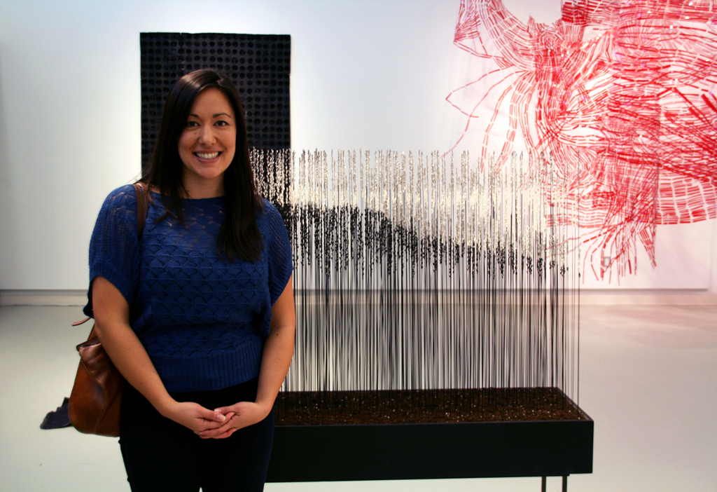 Artist: Emma Nishhimura at the opening of the World of Threads Festival 2014.