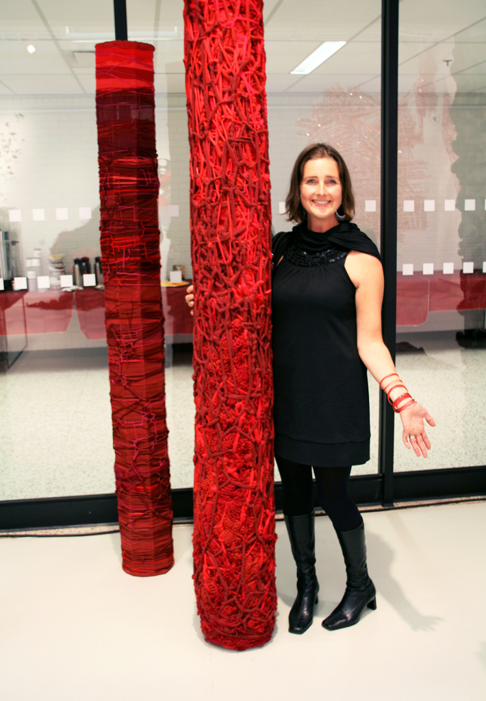 Artist: Julia White at the opening of the World of Threads Festival 2014.