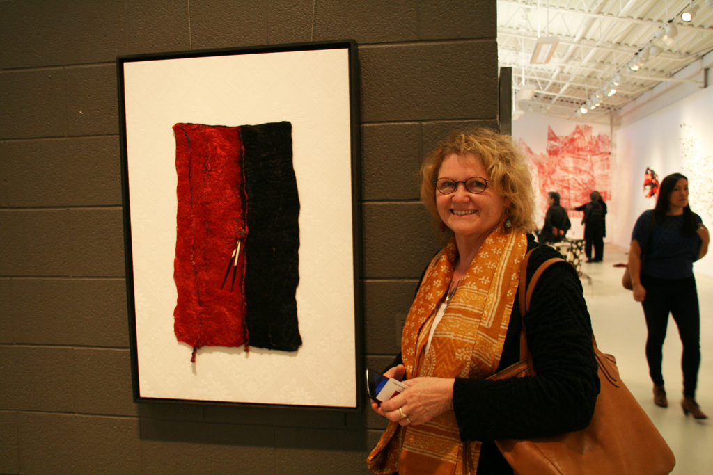 Artist: Sheila Thompson at the opening of the World of Threads Festival 2014.