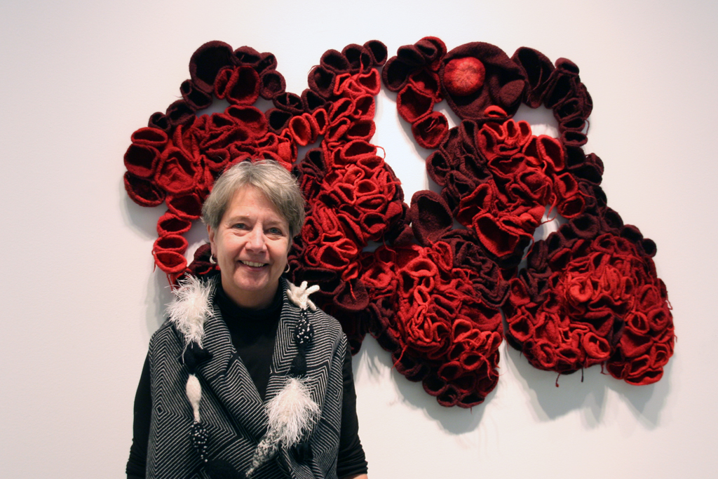 Artist: Chris Motley at the opening of the World of Threads Festival 2014.