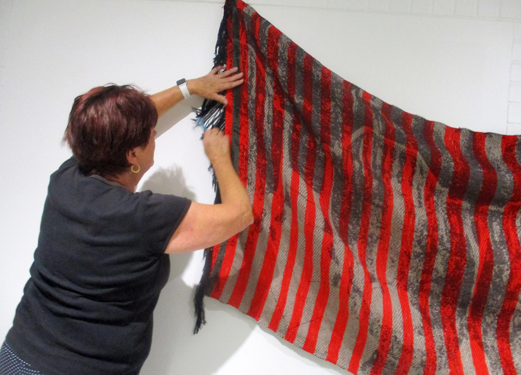 Festival Installer: Freda, installing work by C Pazia Mannella, Solo Show, World of Threads Festival 2023-24.