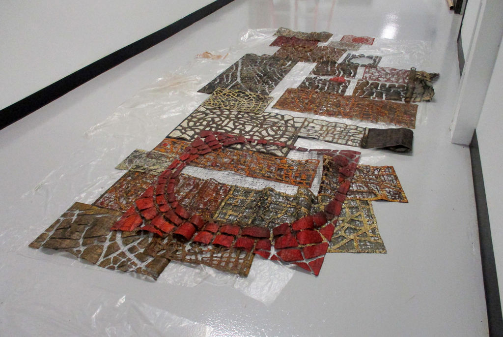 Laying out artwork by Eszter Bornemisza ready for installation, Solo Shows, World of Threads Festival 2023-24.